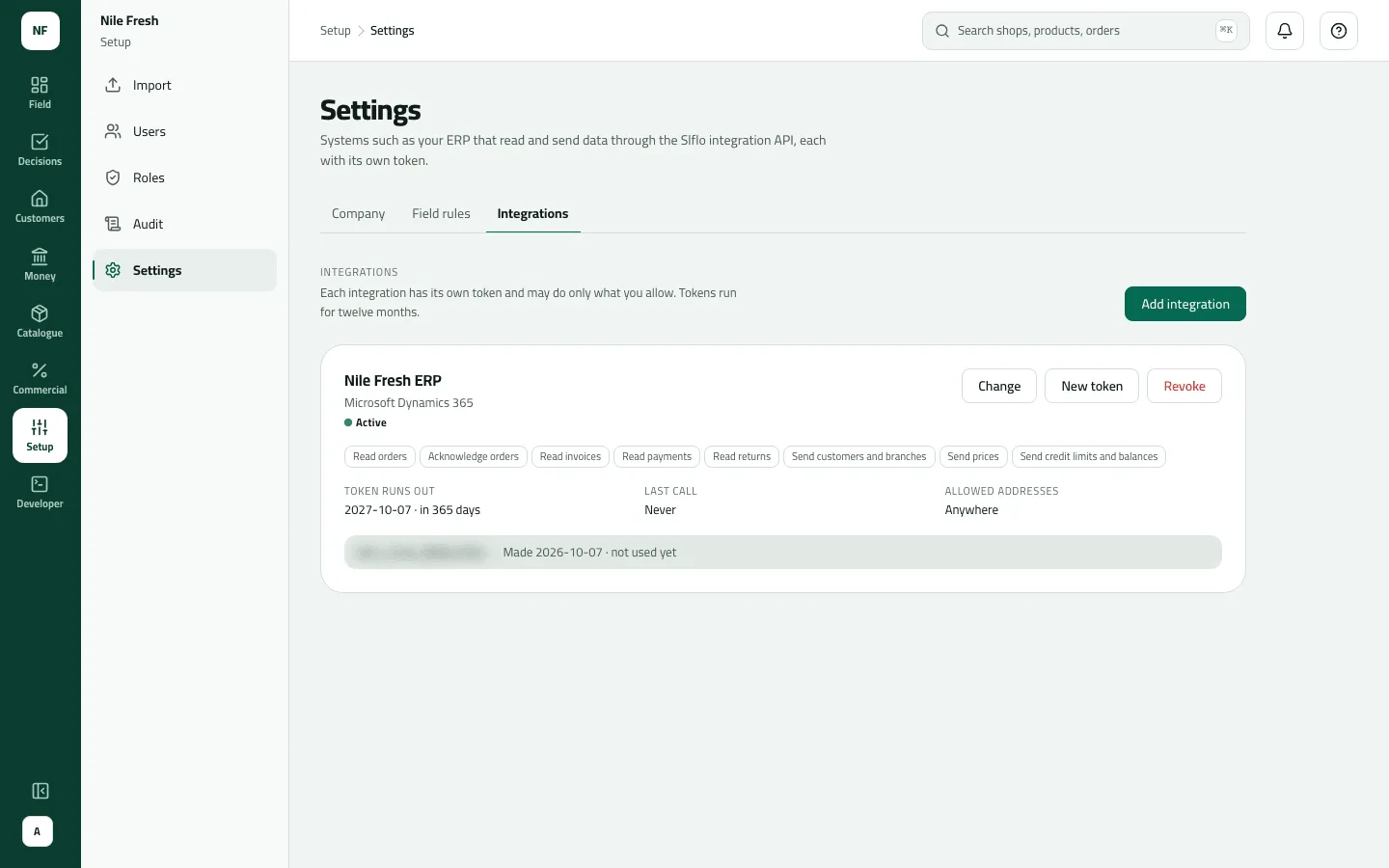 The Integrations tab of Settings with one integration, Nile Fresh ERP on Microsoft Dynamics 365, Active, showing what it may do (read orders, acknowledge orders, read invoices, payments and returns, send customers and branches, prices, credit limits and balances), a token that runs out on 2027-10-07, never called yet, from any address.