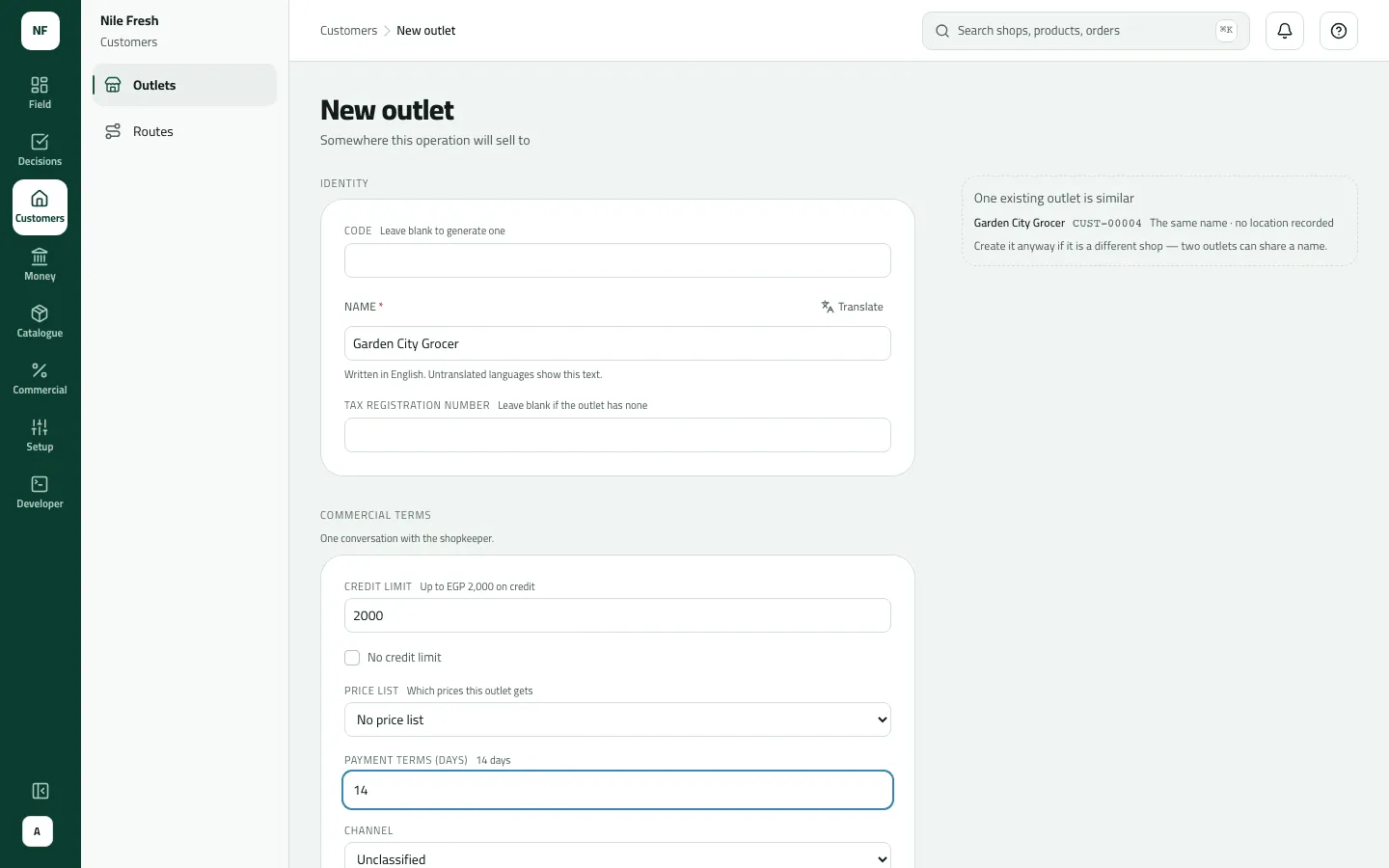 The New outlet form filled in for Garden City Grocer with a 2000 credit limit and 14 payment days, while the side note warns one existing outlet, CUST-00004, has the same name.