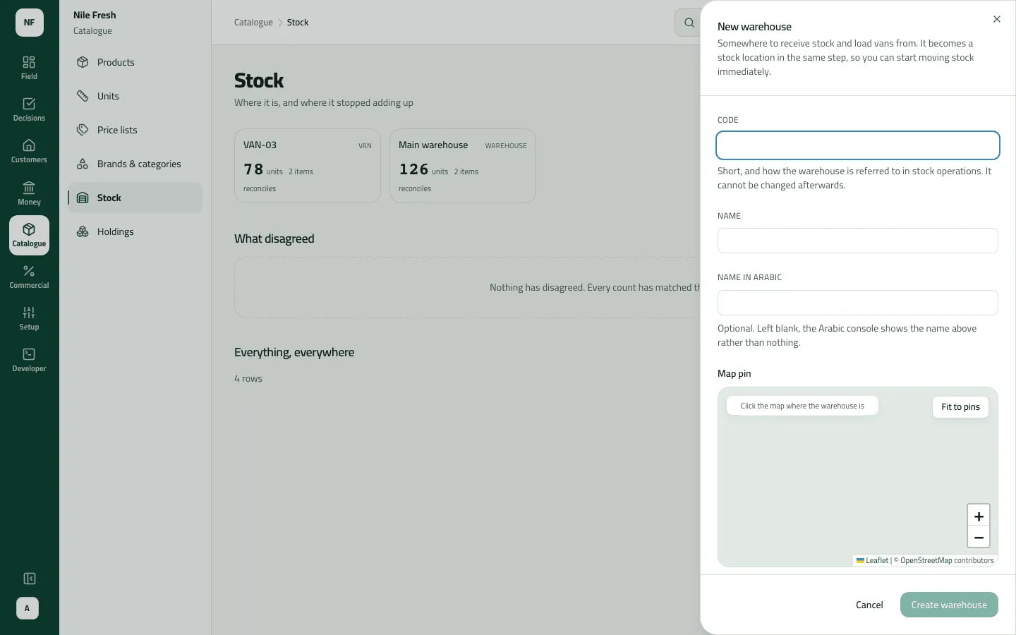 The New warehouse sheet over Stock, with empty code, name and Arabic name fields and a map to click for its pin.