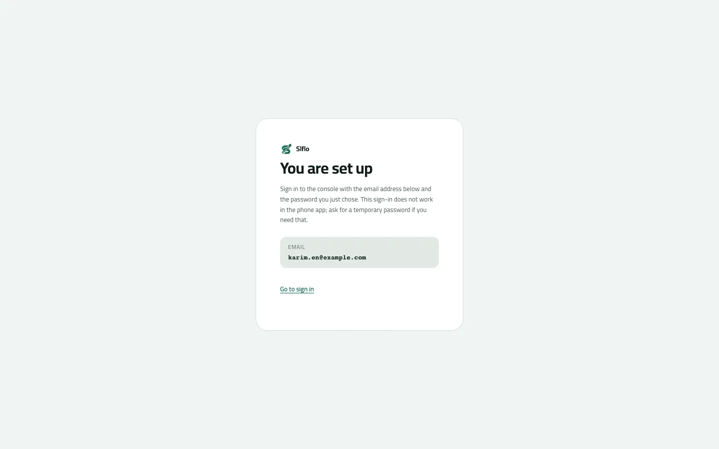 The You are set up screen after accepting an invitation, showing the sign-in email karim.en@example.com and a Go to sign in link.