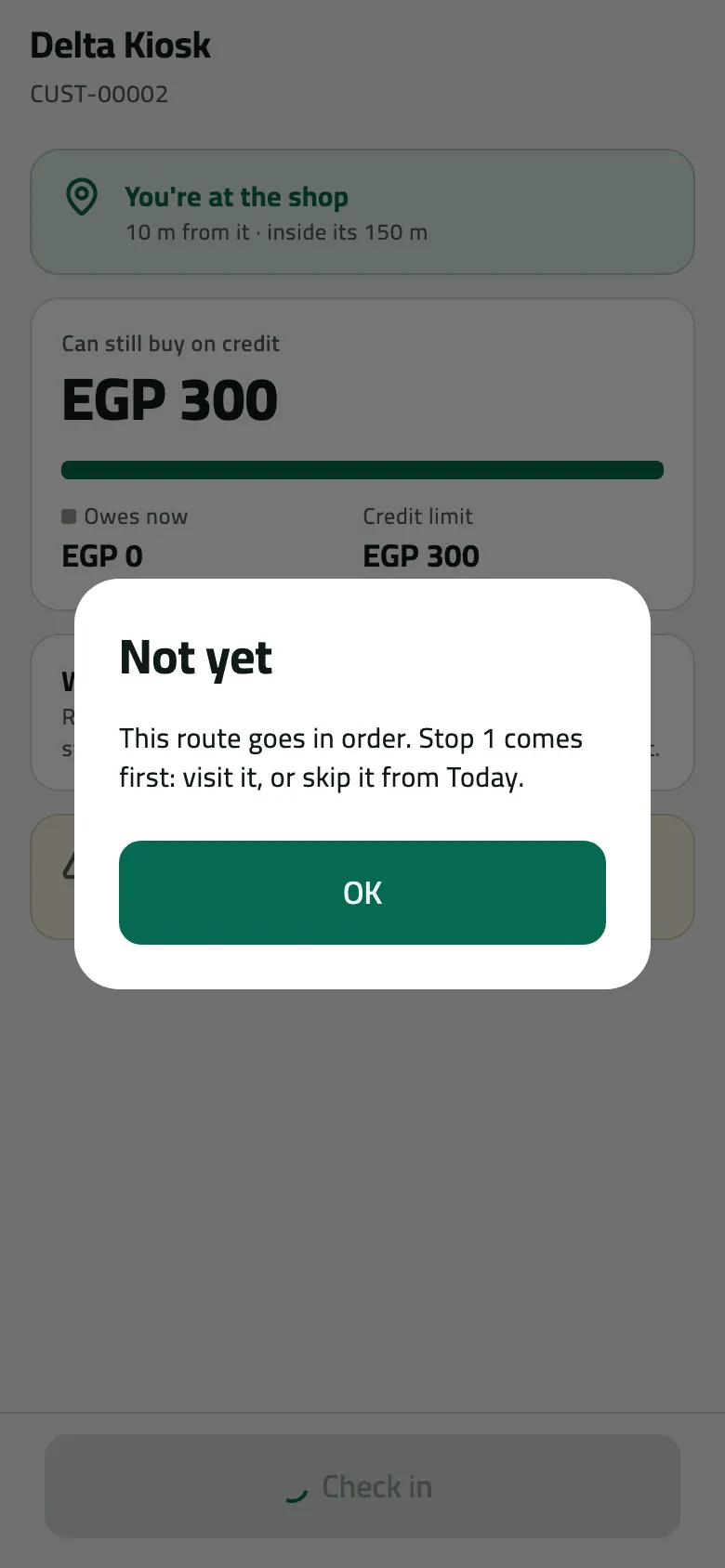 The Not yet dialog over Delta Kiosk's page, although the phone is 10 m from the shop: This route goes in order. Stop 1 comes first: visit it, or skip it from Today, with an OK button.