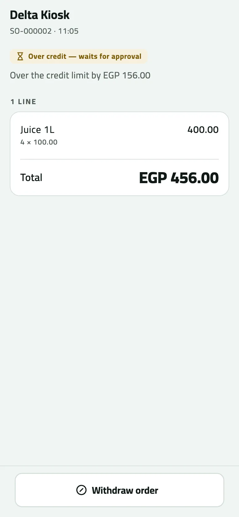 Order SO-000002 for Delta Kiosk, taken at 11:05, marked Over credit — waits for approval and over the credit limit by EGP 156.00: one line of Juice 1L, 4 × 100.00, total EGP 456.00, with Withdraw order at the bottom.