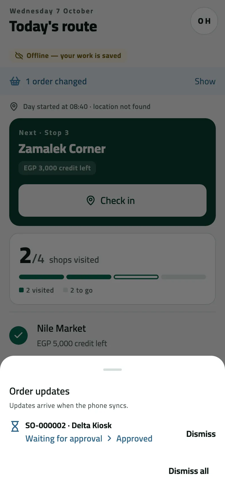 The Order updates sheet over Today's route, which shows 1 order changed: Updates arrive when the phone syncs, and one row, SO-000002 · Delta Kiosk, Waiting for approval › Approved, with Dismiss and Dismiss all.