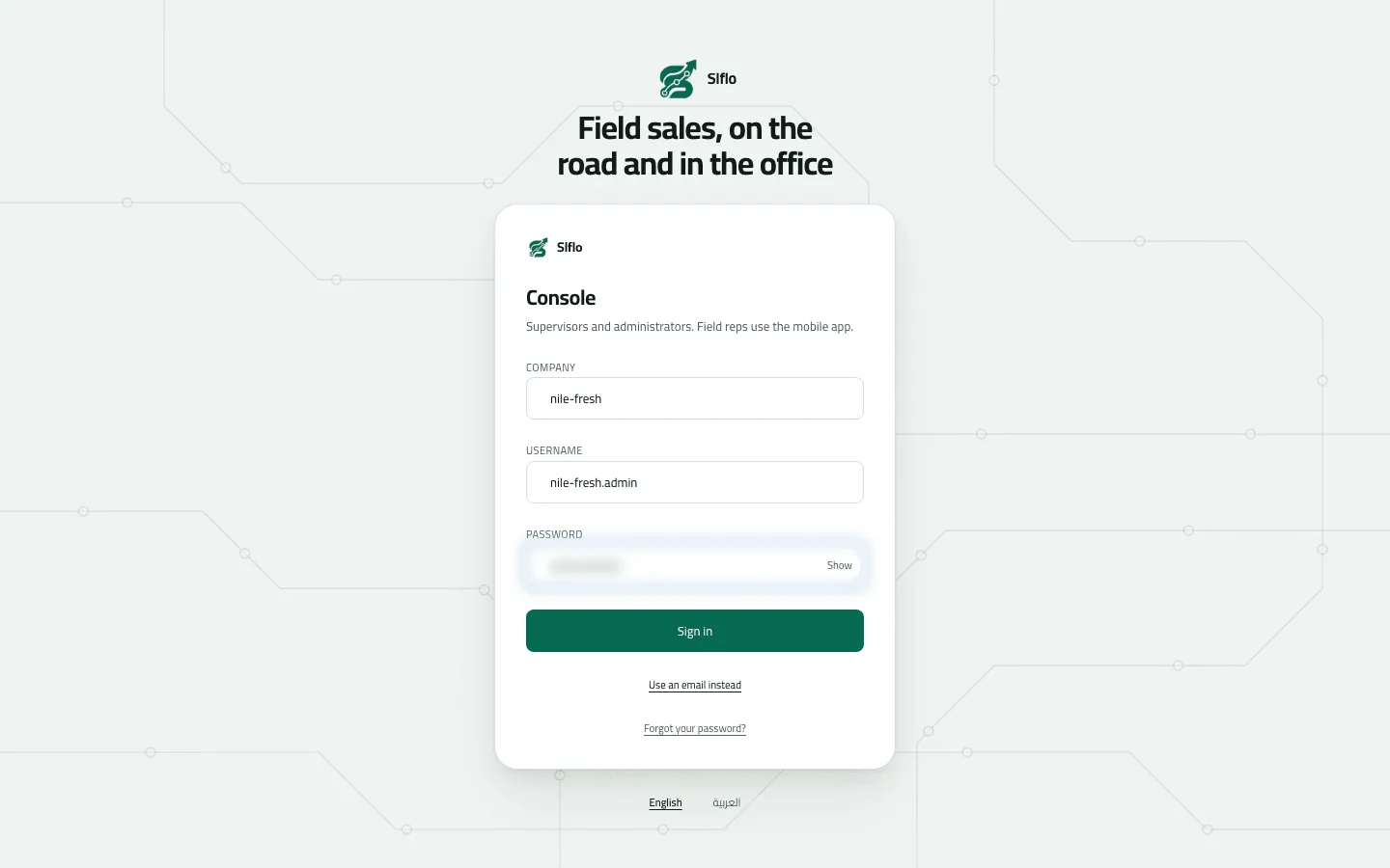 The sign-in card on its username door, filled in with company nile-fresh, username nile-fresh.admin and a hidden password, above the Sign in button.